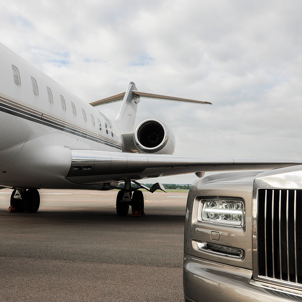 airport car & limo service stay behind plane