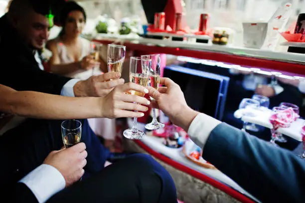 friends enjoying in party limo